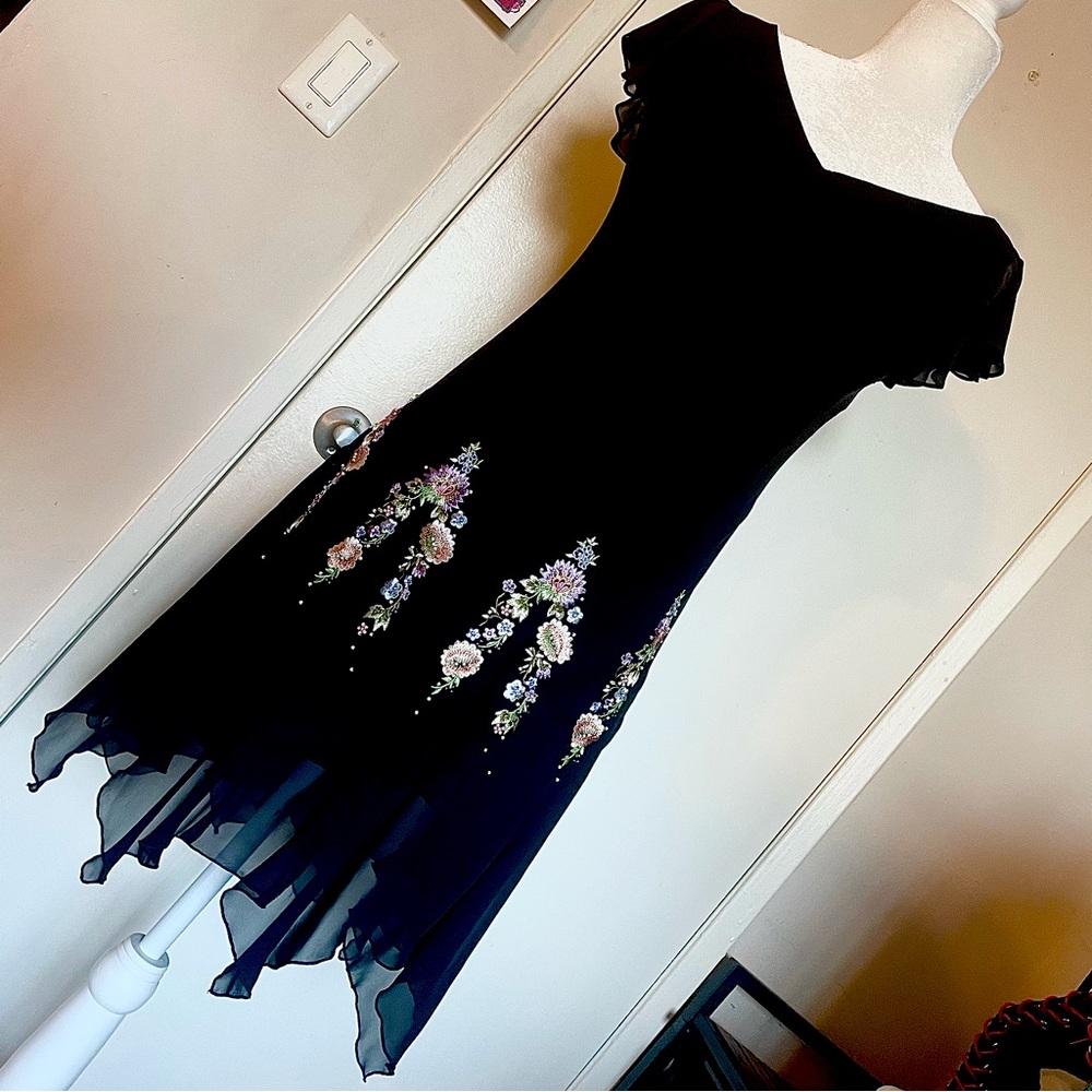 beautiful fairy style flowy dress with floral embroidery
